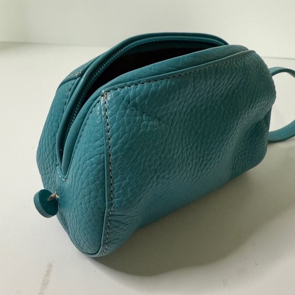 Adrienne Vittadini Teal wristlet leather bag